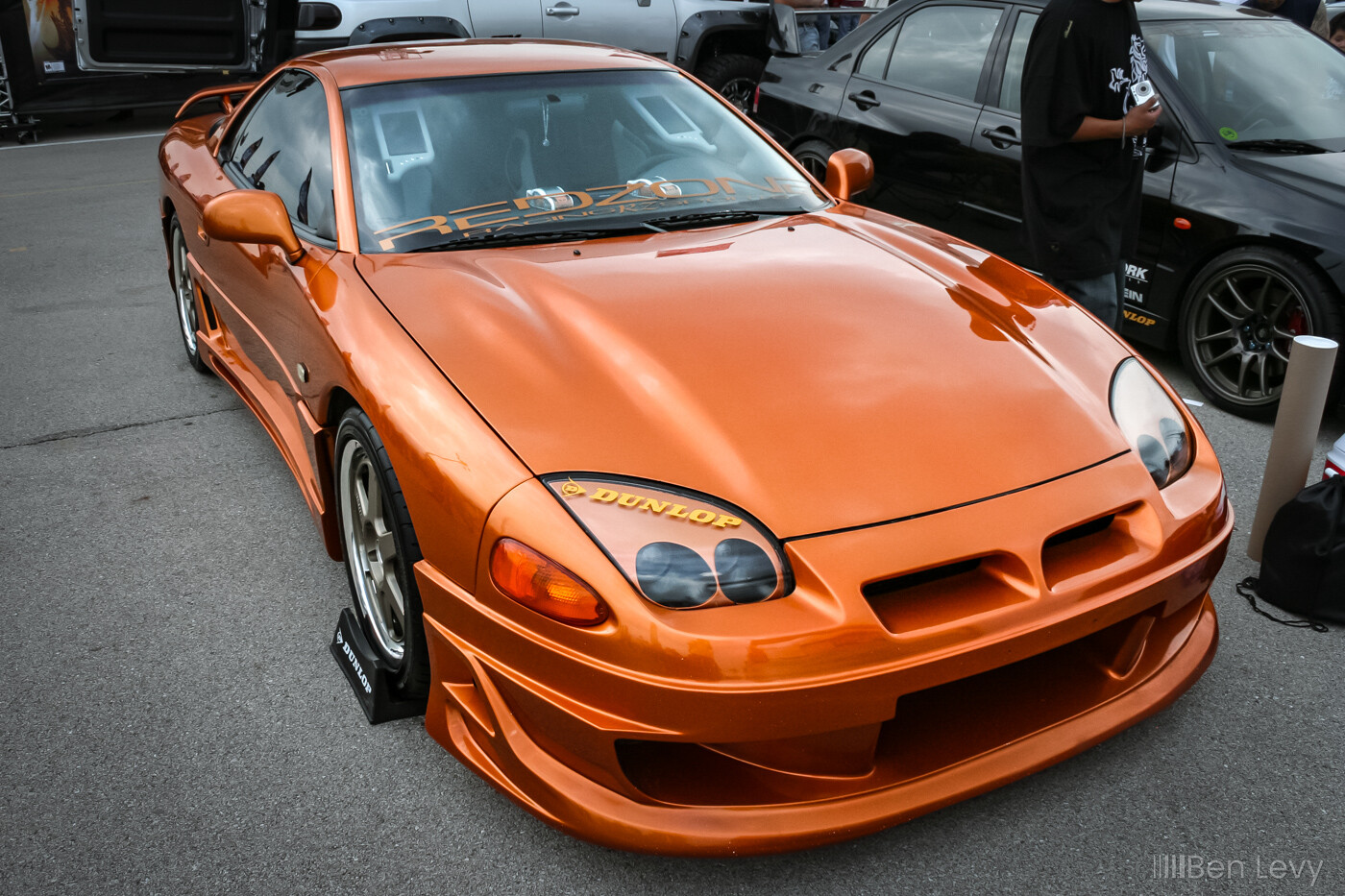 Orange Mitsubishi 3000GT with the Redzone Racing Crew