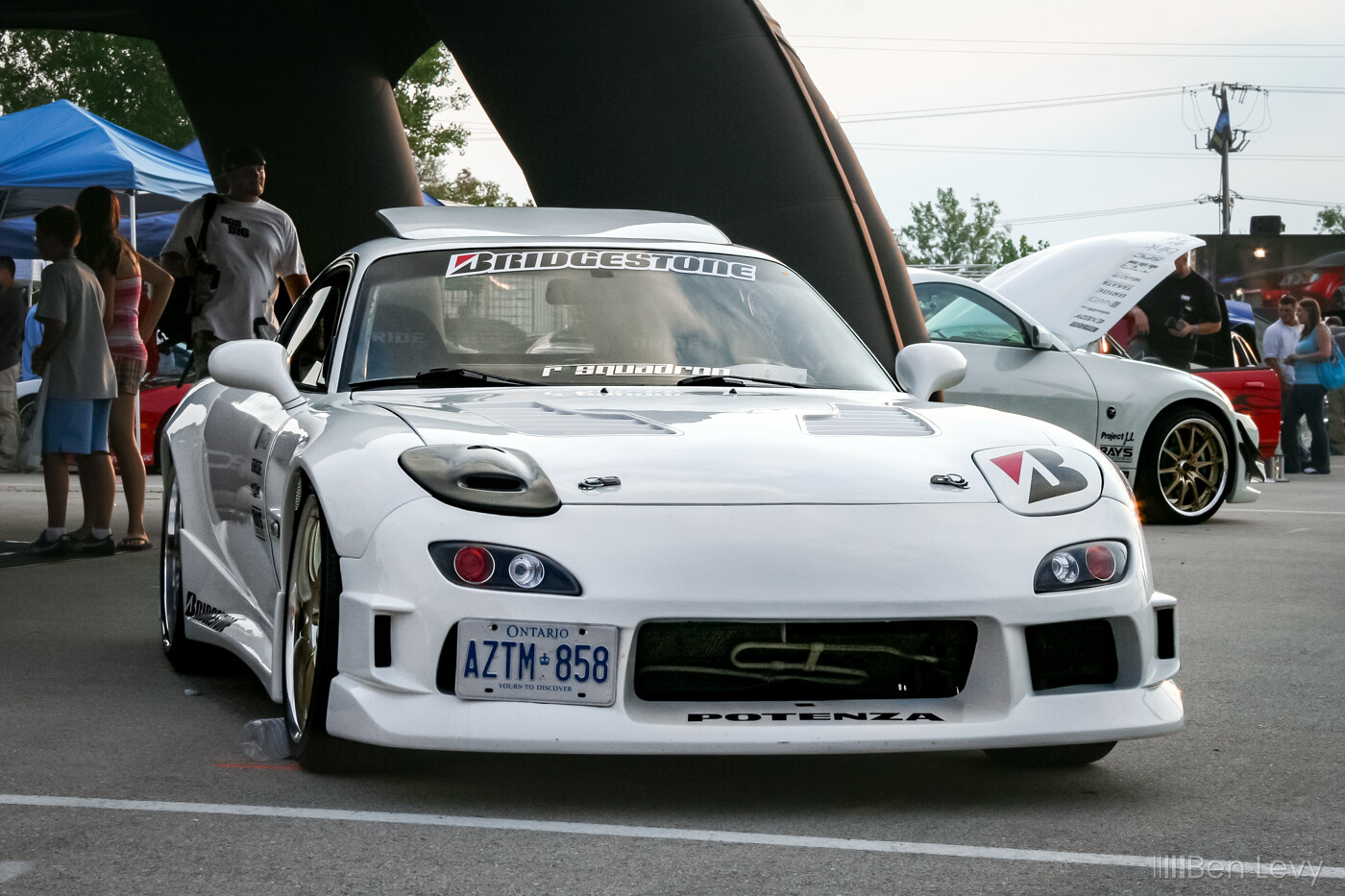 Front of Modified White Mazda RX-7 at Hot Import Nights