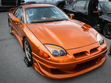 Orange Mitsubishi 3000GT with the Redzone Racing Crew