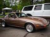 Brown 1984 Mazda RX-7 with Cafe Racing