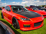 Red Mazda RX-8 with Team Elevate