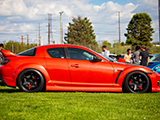 Side of Mazda RX-8 with Red Wrap