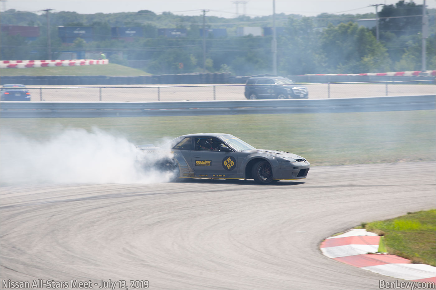 Smoking Tires wile Drifting a Grey S13 Nissan