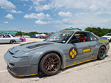 Grey Nissan 240SX coupe with Rocket Bunny Kit