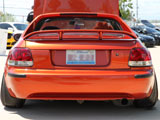Rear of Burnt Orange Honda del Sol