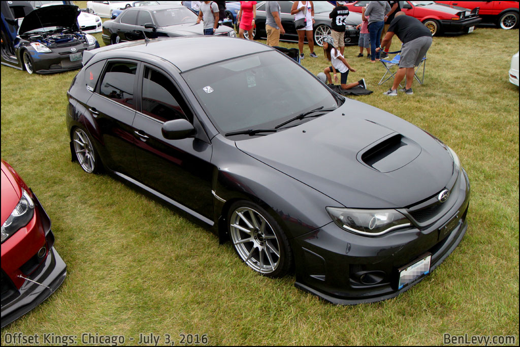 Black Subaru WRX STI hatchback