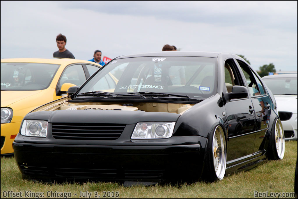 Black VW Jetta with Stubby Mirrors and Shaved Front Emblem