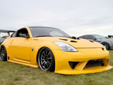 Yellow Z33 with Supercharger Poking out of Hood