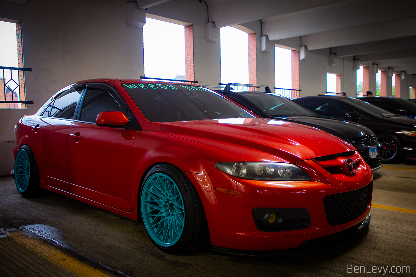 Red Mazdaspeed6 at the Parking Garage Party