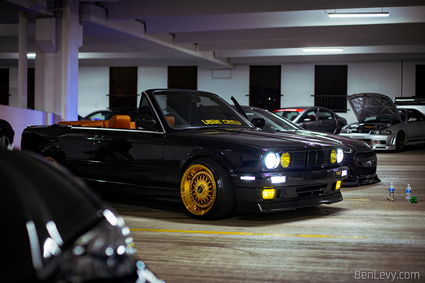Black BMW E30 Convertible at the Parking Garage Party