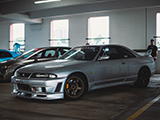 Silver Nissan Skyline GT-R at Parking Garage