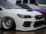 Tasteful Mods on the front of a White Subaru WRX