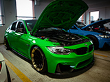 Green F80 BMW M3 at Parking Garage Party