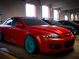 Red Mazdaspeed6 at the Parking Garage Party