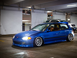 Bagged EG Civic leaving the Parking Garage Party