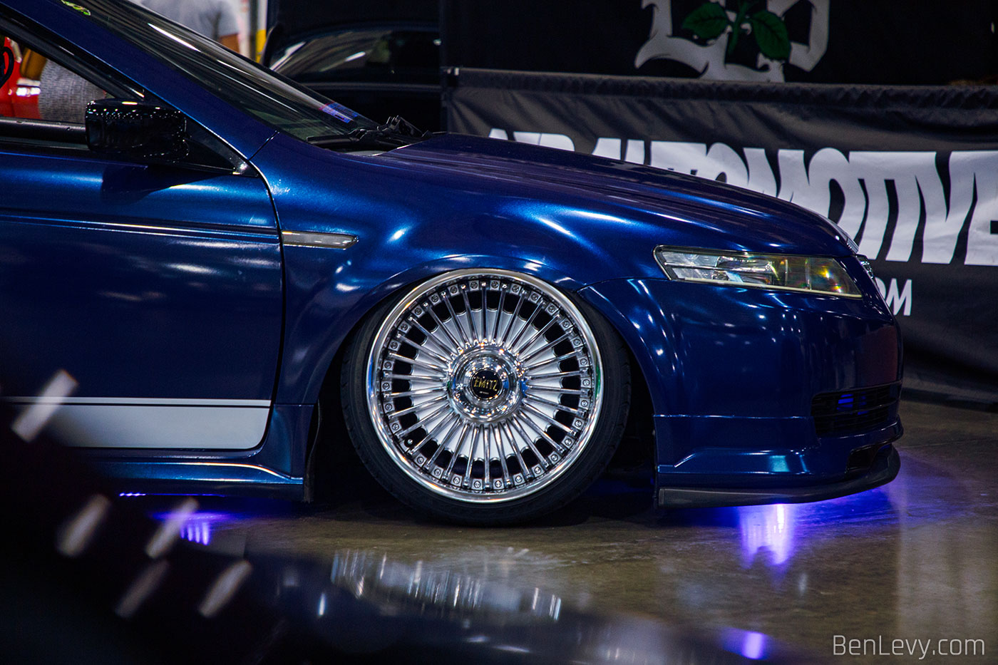 Blue Acura TL with Emitz wheels