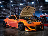 Aired-out ZC6 Subaru BRZ with orange wrap
