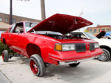 Red Oldsmobile Cutlass with hydrololics