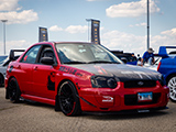 Red Subaru Impreza at Subiefest Midwest