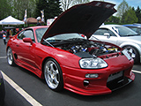 Red Toyota Supra with full body kit