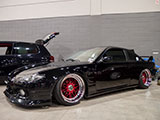 Black Nissan 240SX with front-end conversion