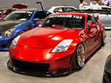 Red Nissan 350Z with wooden steering wheel