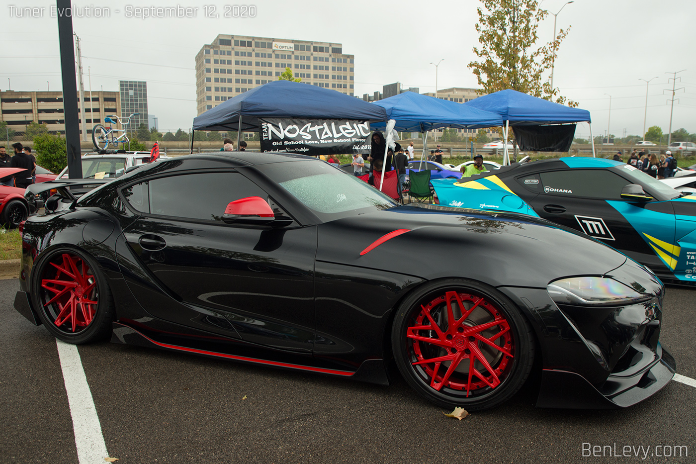 Black Toyota Supra with red accents