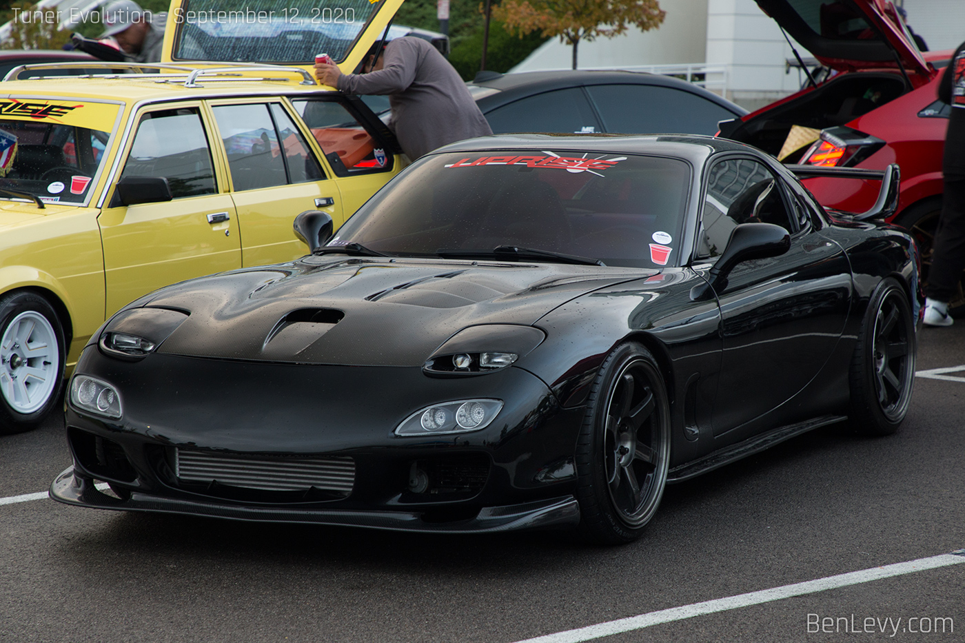 Black Mazda RX-7 with Uprise