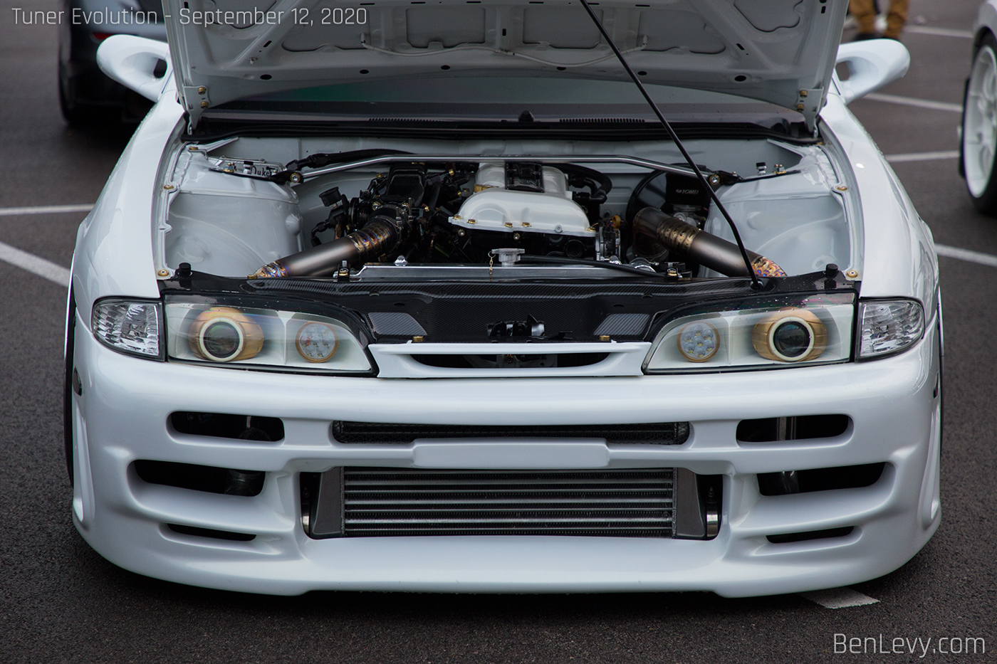 Front of White Nissan 240SX with Custom Headlights