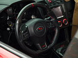 Black and Red Carbon Fiber Steering Wheel in WRX STI