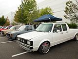 White 4-door Volkswagen Caddy