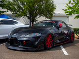 Black Toyota Supra with Red Accents