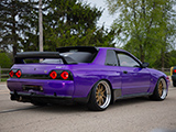 Purple R32 Nissan Skyline GT-R leaving Tuner Fest