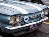 Front  bumper on blue Chevrolet Corvair
