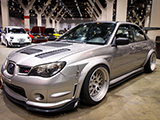 Silver WRX STI with vented hood