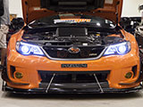 Front of orange Subaru WRX