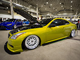 Yellow Infiniti G37s coupe with Royal Fitmment