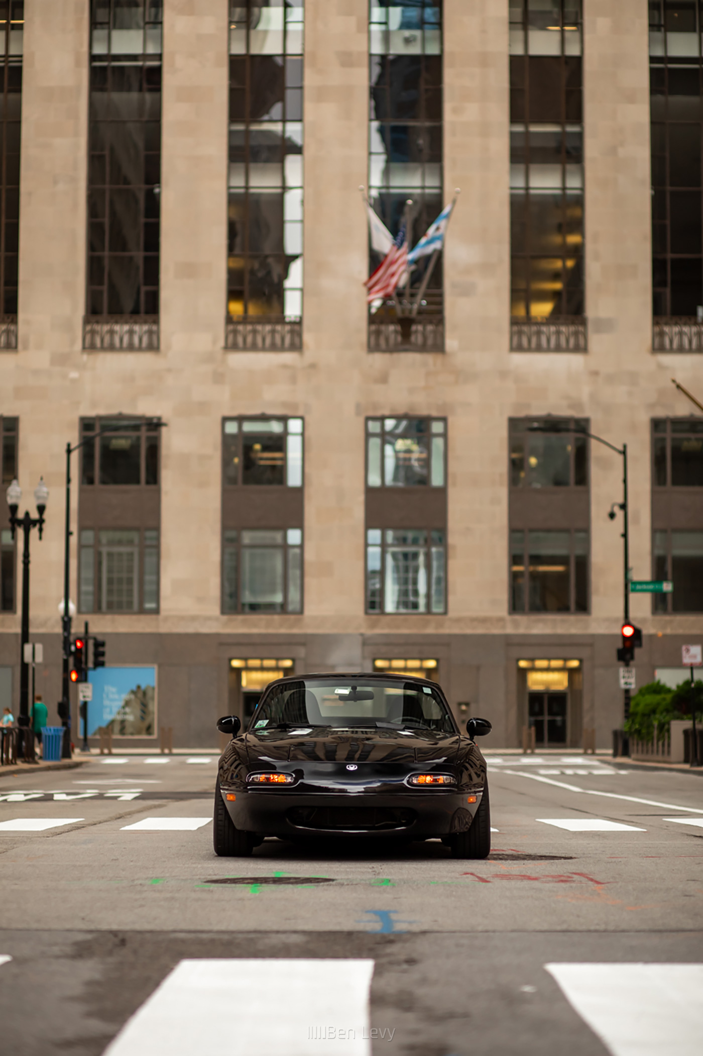 Black Mazda Miata in front of the Chicago Board of Trade