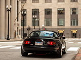 Black Mazda Miata on LaSalle Street in Chicago's Financial District