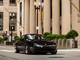 Black Miata with the Federal Reserve Bank of Chicago in the Background