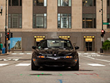 Black Mazda Miata in front of the Chicago Board of Trade