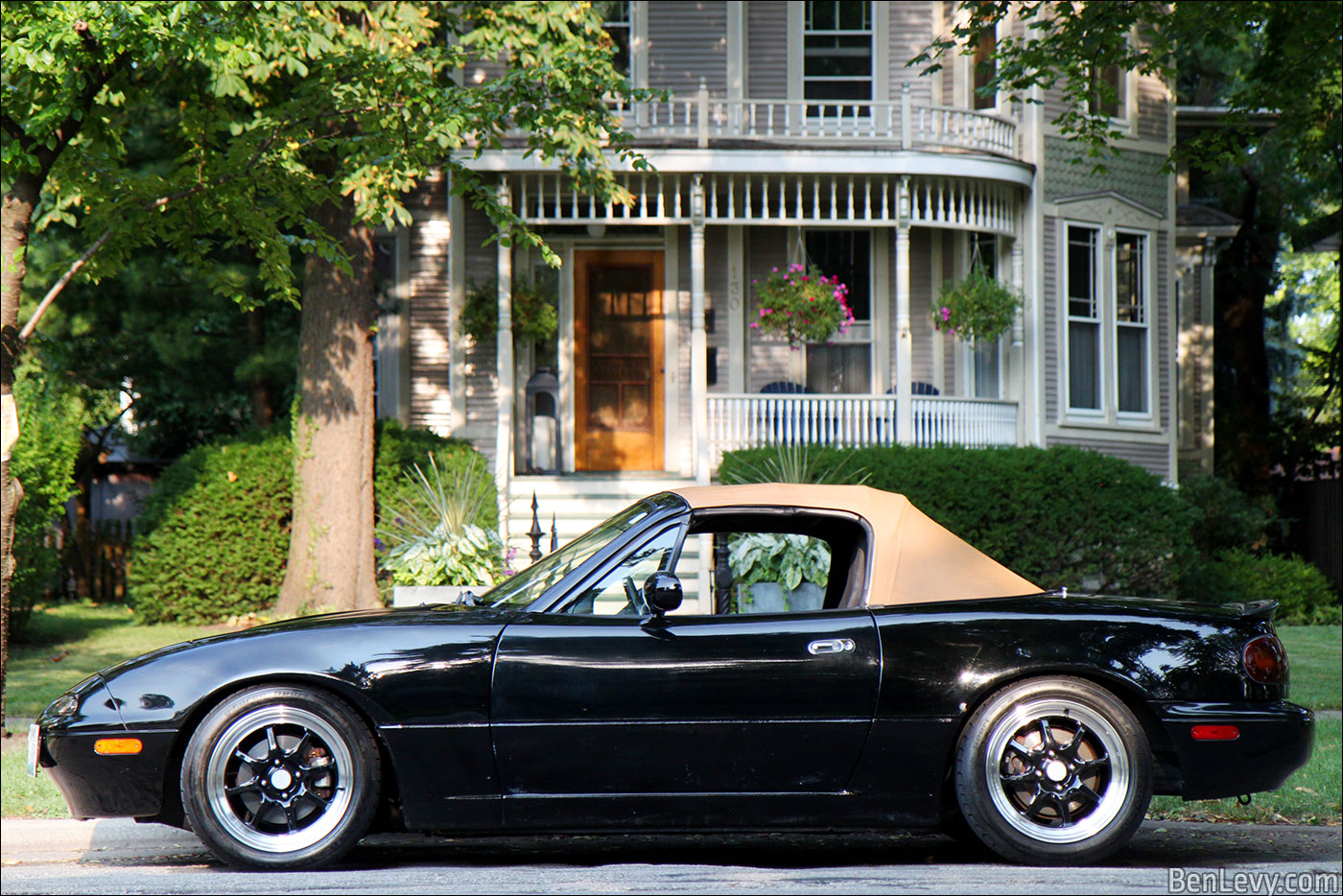 Mazda Miata in front of the John D. Caldwell House