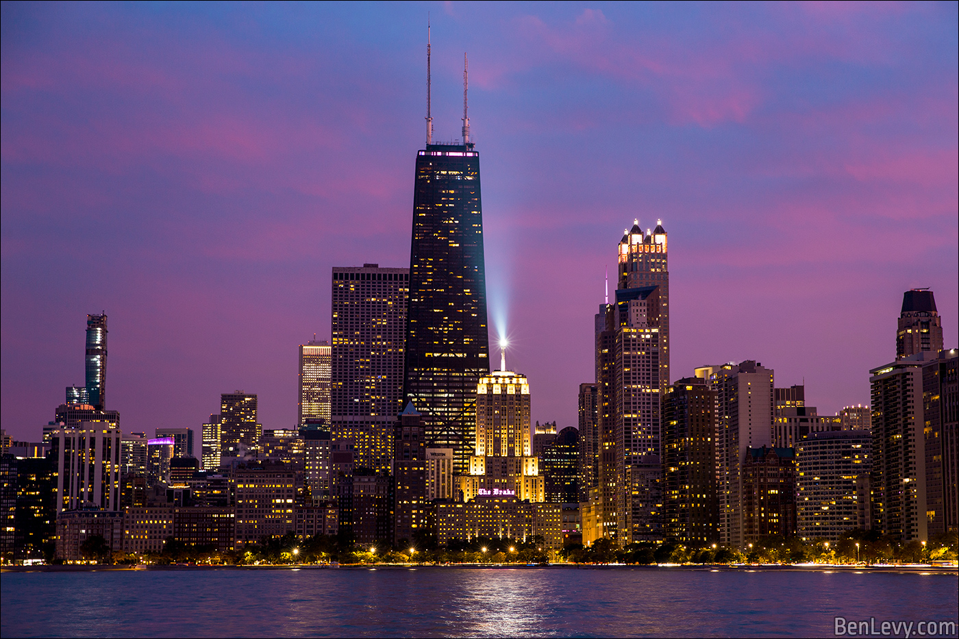 The beacon on the Palmolive Building shining at night