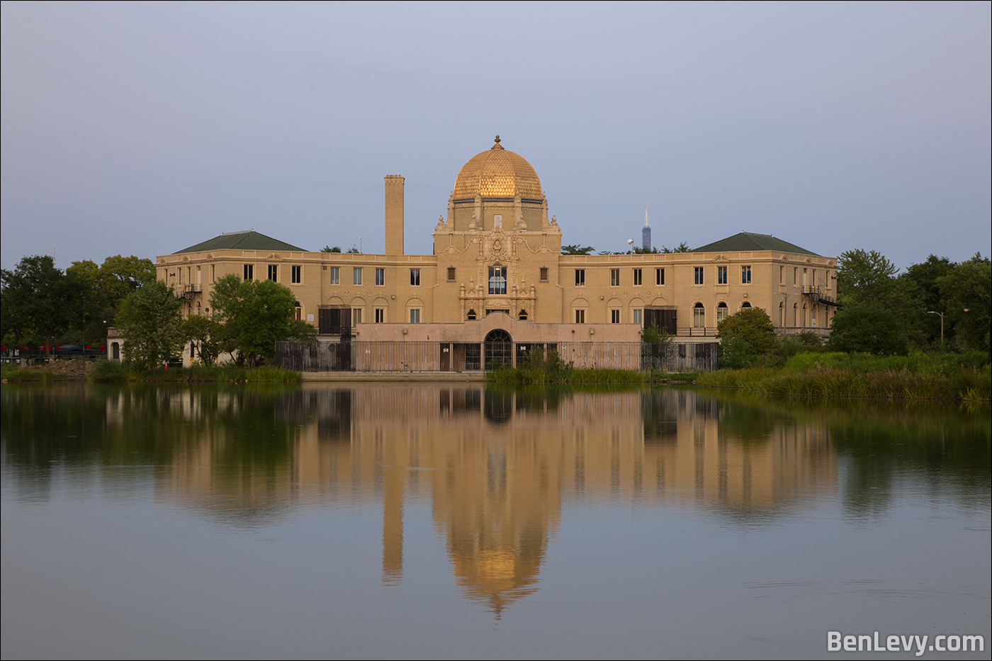 The Garfield Park Fieldhouse reflected in the lagoon