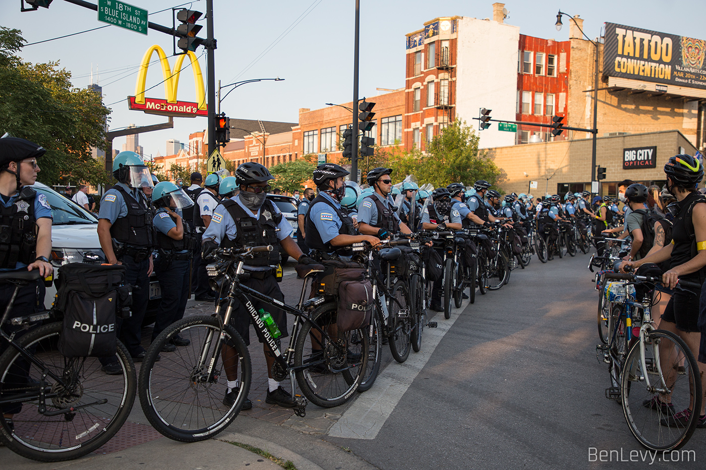 Police and Protestors Form Line of Bicycles in Pilsen