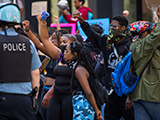 Black youth protesting police in Chicago