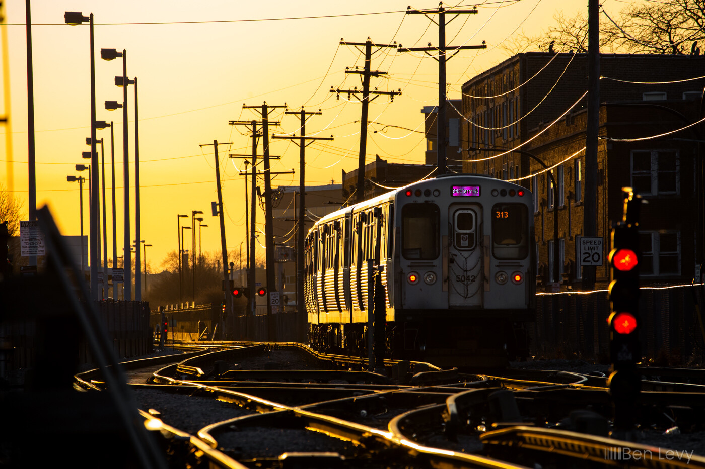 A golden sunset on the Pink Line tracks