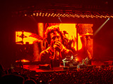 Zack de la Rocha on screen at a RATM concert in Chicago on July 12, 2022